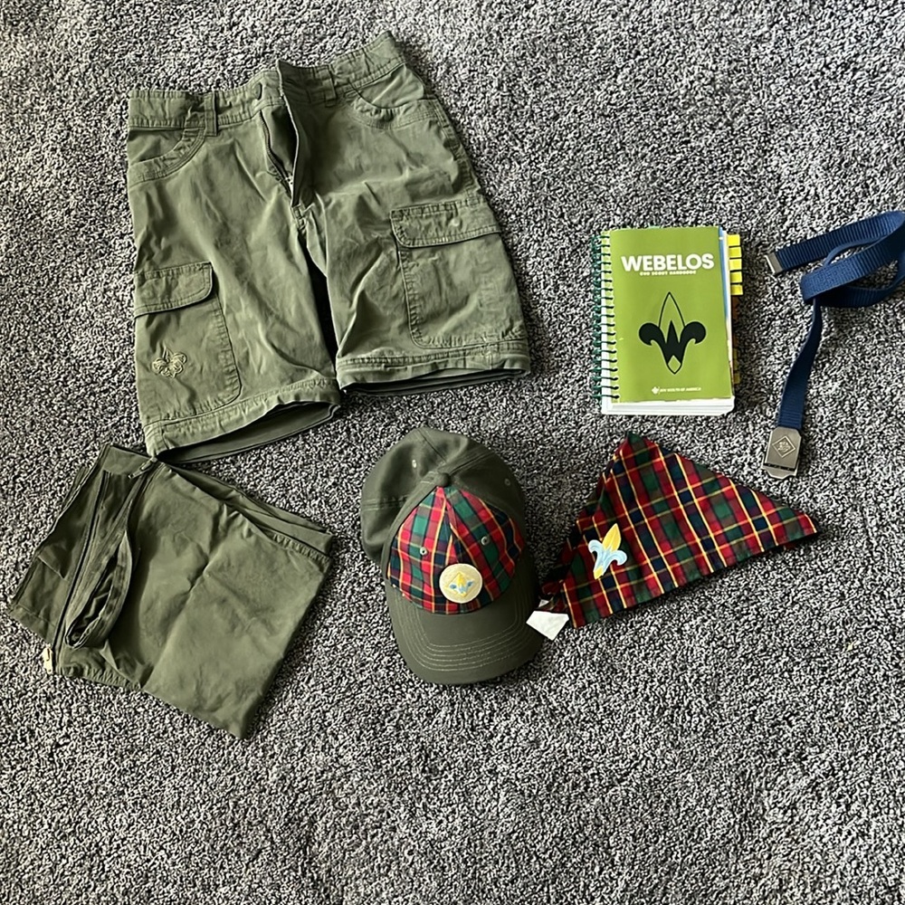 Webelos hat, kerchief, book, size 12 pants/shorts and Cub Scout belt.